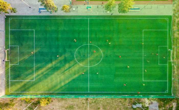 Which is bigger soccer or football?