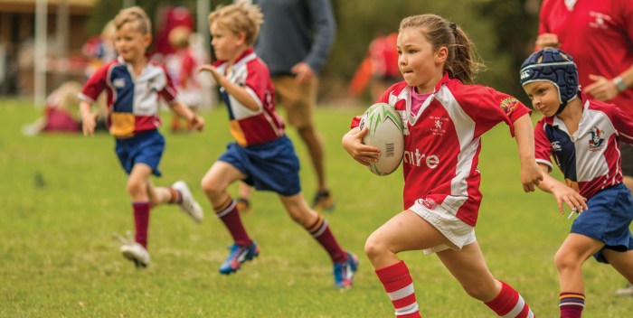 Are rugby players stronger than football players?