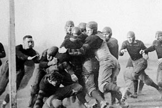 Why is 🏈 called football?