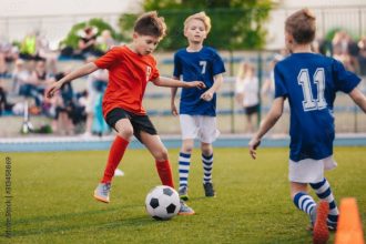 Is rugby more like soccer or football?