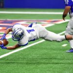 Why do Americans call it football?