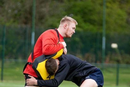 Is rugby a tackle or touch?